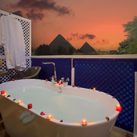 Turquoise Pyramids & Grand Egyptian Museum View Hotel Kafret el-Gabal Buitenkant foto